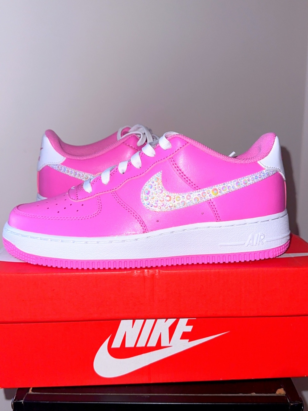 Nike Pink Low-Top Sneakers with Iridescent Crystal Swoosh